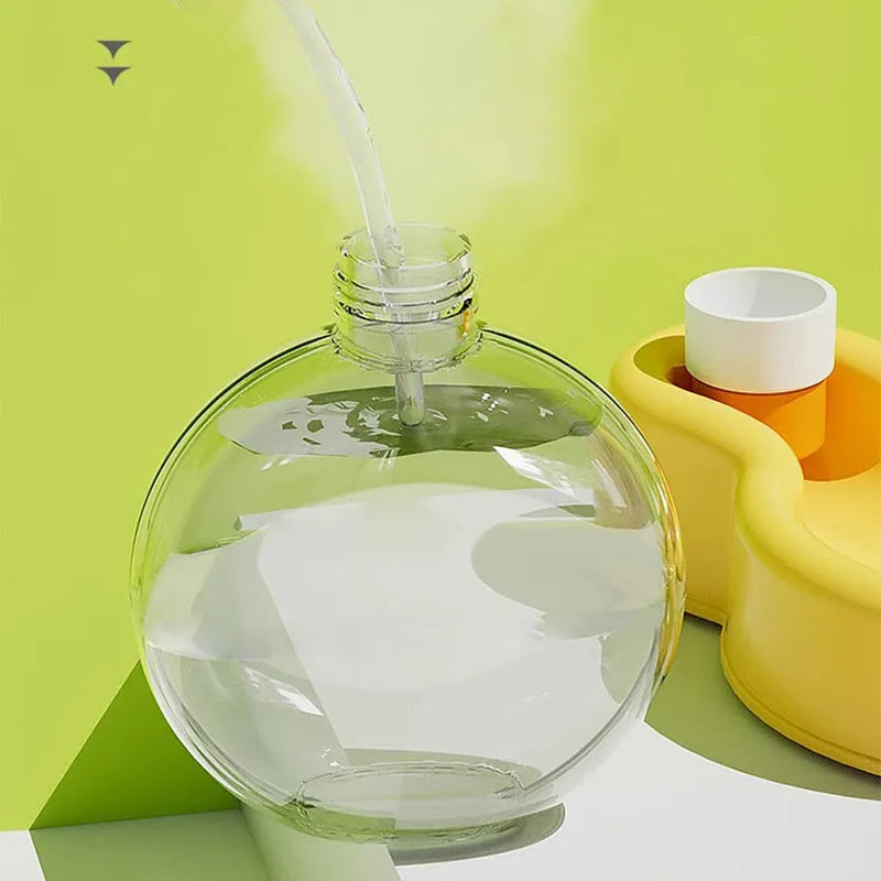 Green pet travel cup with integrated bowl for dogs, showing leak-proof design and portable size
