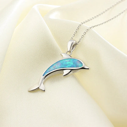 Ocean Dolphin Pendant Copper Necklace with opal detail, showcasing the intricate dolphin design and adjustable chain.