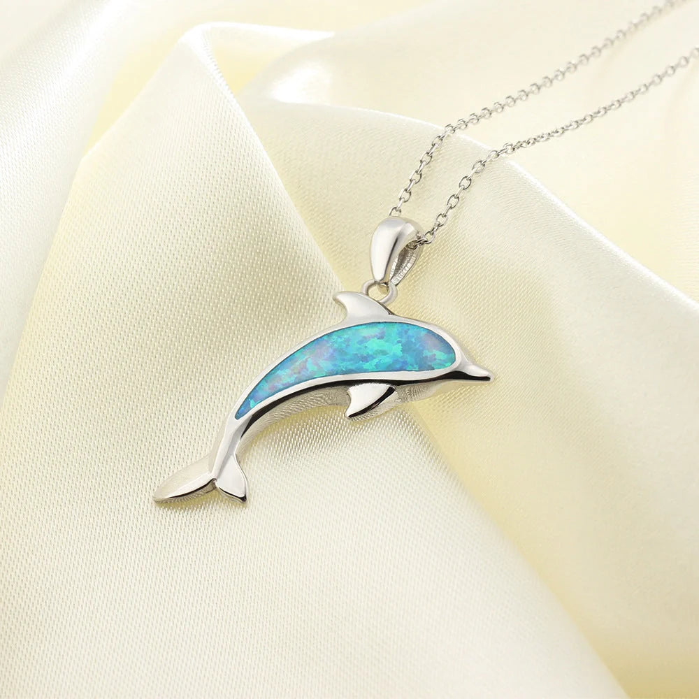 Ocean Dolphin Pendant Copper Necklace with opal detail, showcasing the intricate dolphin design and adjustable chain.