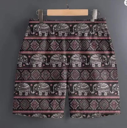 Men's casual polyester shorts in a camouflage pattern, shown with a relaxed fit for outdoor use.