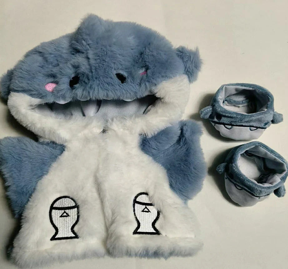 30cm doll clothing collection showing multiple outfit pieces including hooded jackets, sweaters, and suspender pants