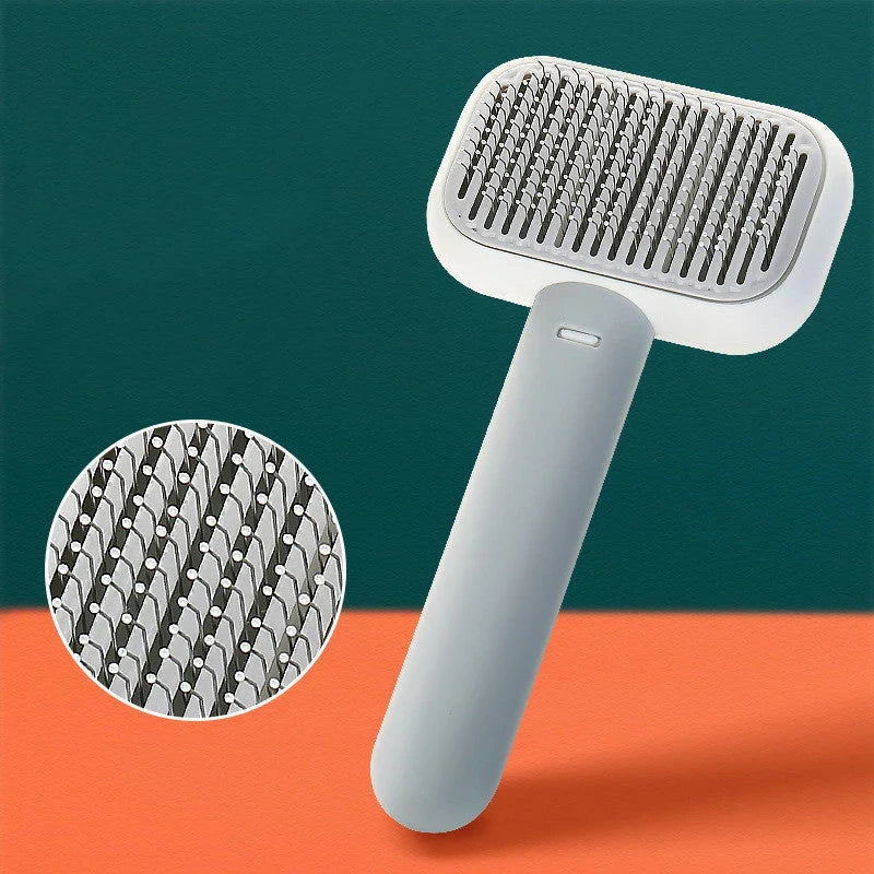 Premium pet hair brush in grey, pink, and green colors with stainless steel construction for easy grooming and massage