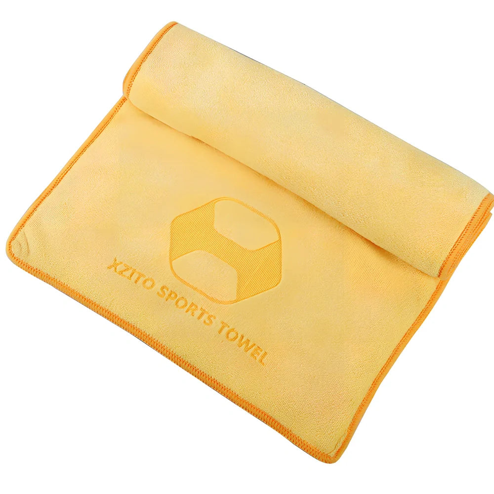 Blue sports sweat absorbent towel with 100x30cm dimensions and polyester-nylon fabric for athletic use