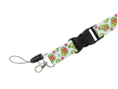 Green avocado cartoon print on a white polyester phone lanyard with a silver buckle.
