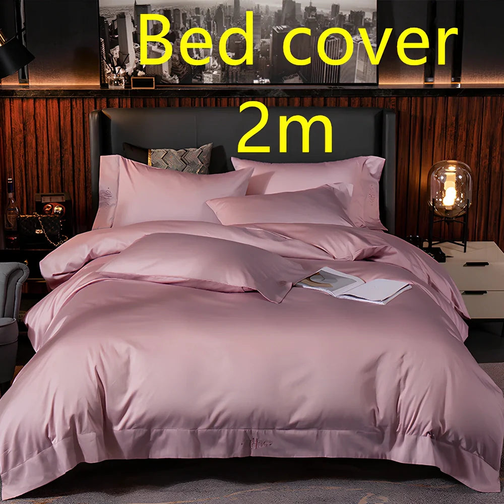 Four-piece quilted cotton bed set in royal blue, showing 200x230 cm cover and 48x74 cm pillowcases for 1.5m bed