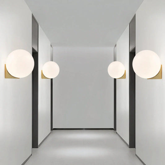 Nordic minimalist wall lamp with adjustable double heads in black finish mounted on white wall