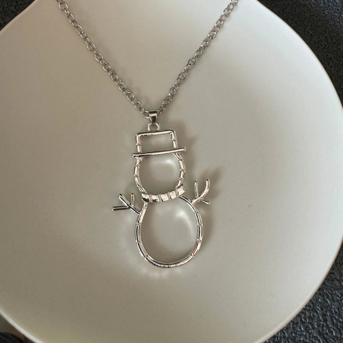 Personalized snowman-themed earrings and pendant set for Christmas, made of durable zinc alloy.
