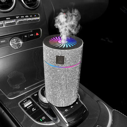 White Diamond finish car air purifier and humidifier unit mounted on a car dashboard.