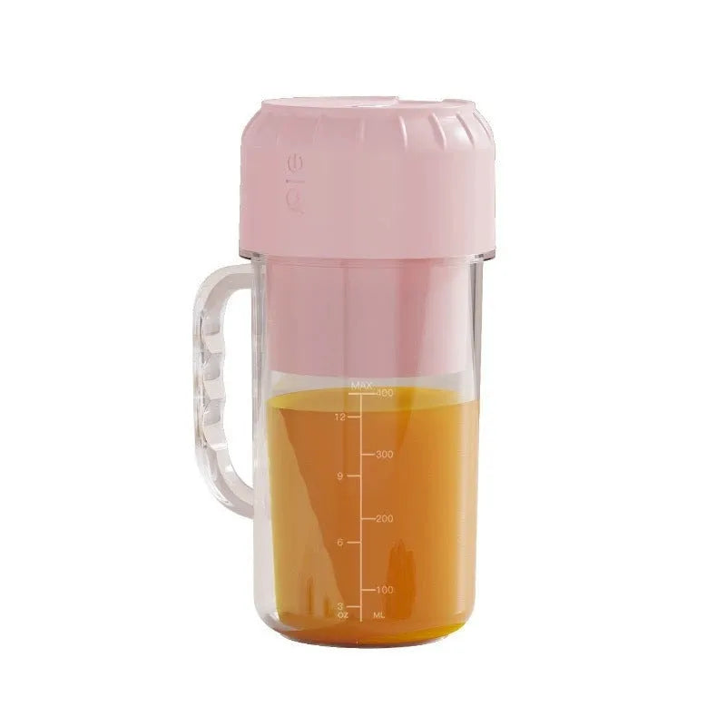 Portable USB-powered juicer in avocado green colour with blending jug