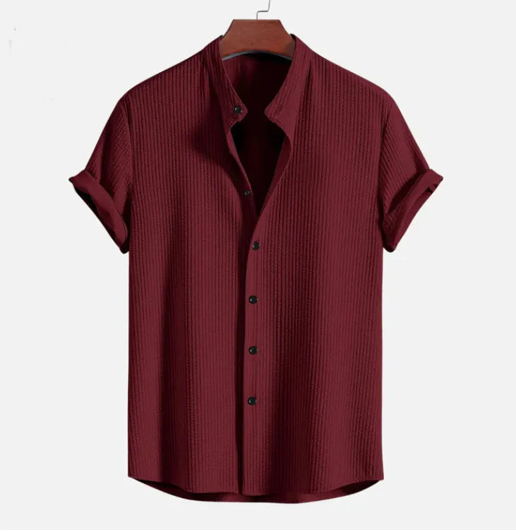 Men's loose short sleeve shirt in polyester, available in colours like wine red and navy blue, sizes S to 4XL