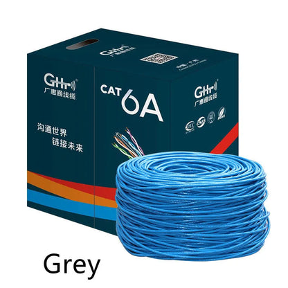 A reel of blue Category 6 network cable with oxygen-free copper core, showing the 305m length label.