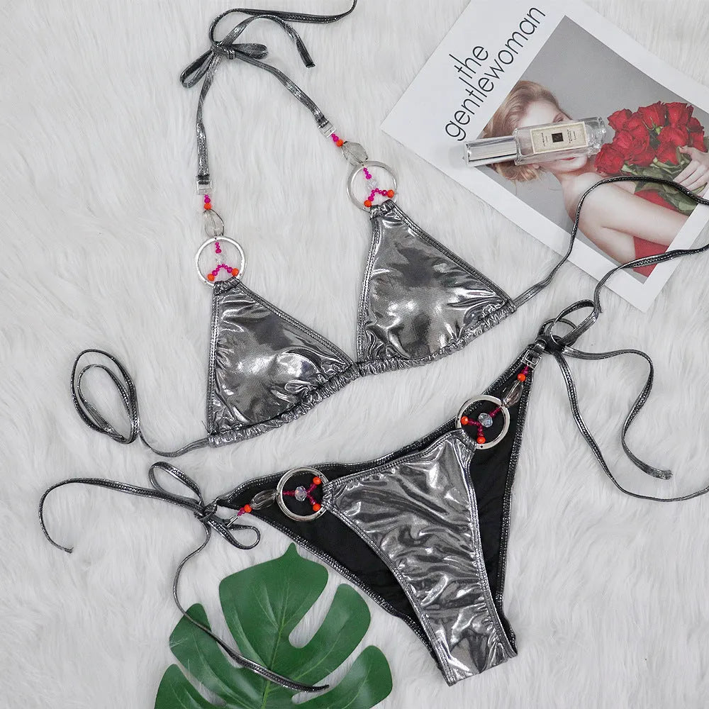 Silver women's bikini set with split-side briefs on mannequin