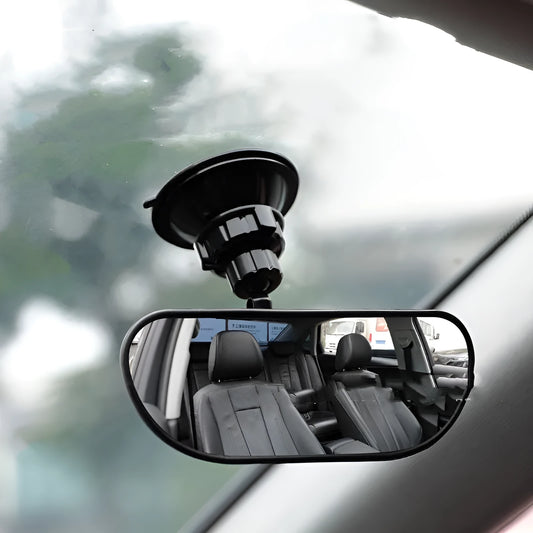 Black 360-degree rotating car rearview mirror with sucker mount on a car windshield