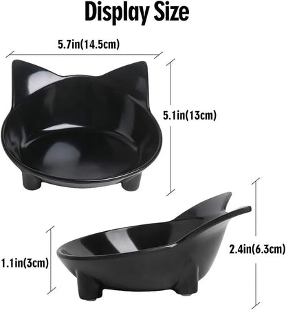 Black shallow melamine pet bowl with non-slip rubber base on a kitchen floor
