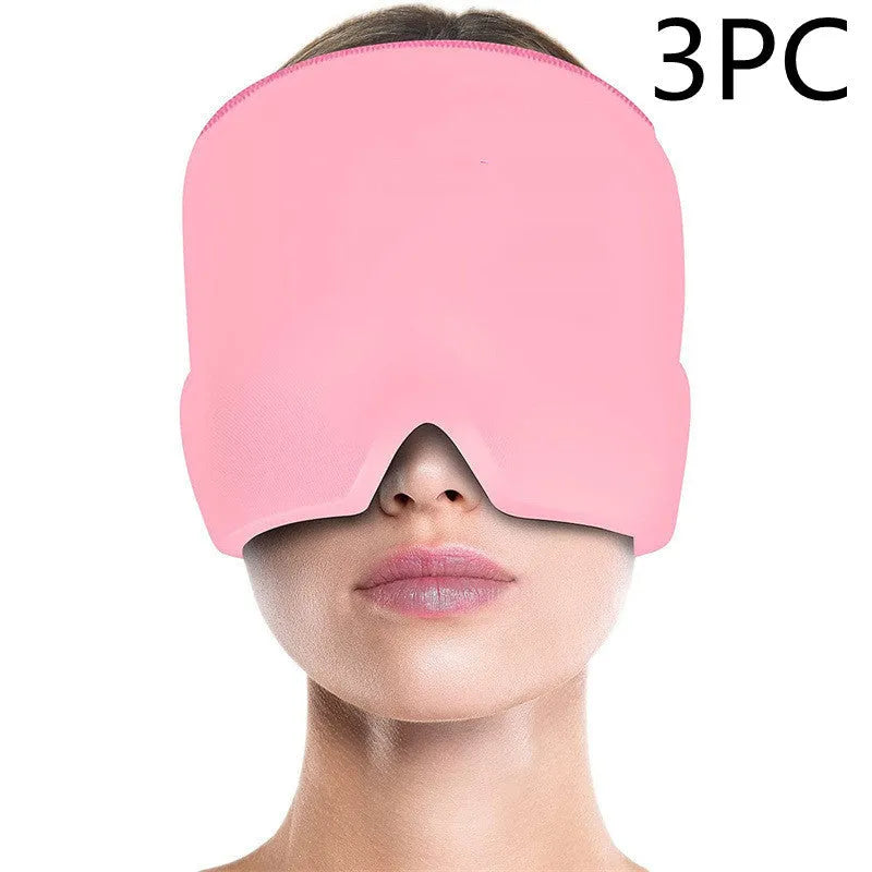 Black elastic cooling gel eye mask for headache relief placed on a forehead.