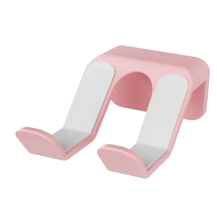 Black ABS plastic wall hanging rack with an X-shaped handle, shown with adhesive gel and screws for mounting.