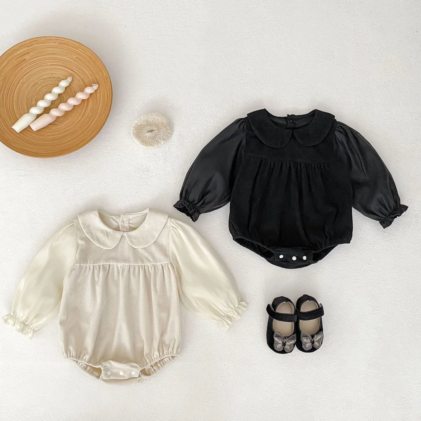 Corduroy doll collar long sleeve baby romper in black or apricot with single-breasted closure