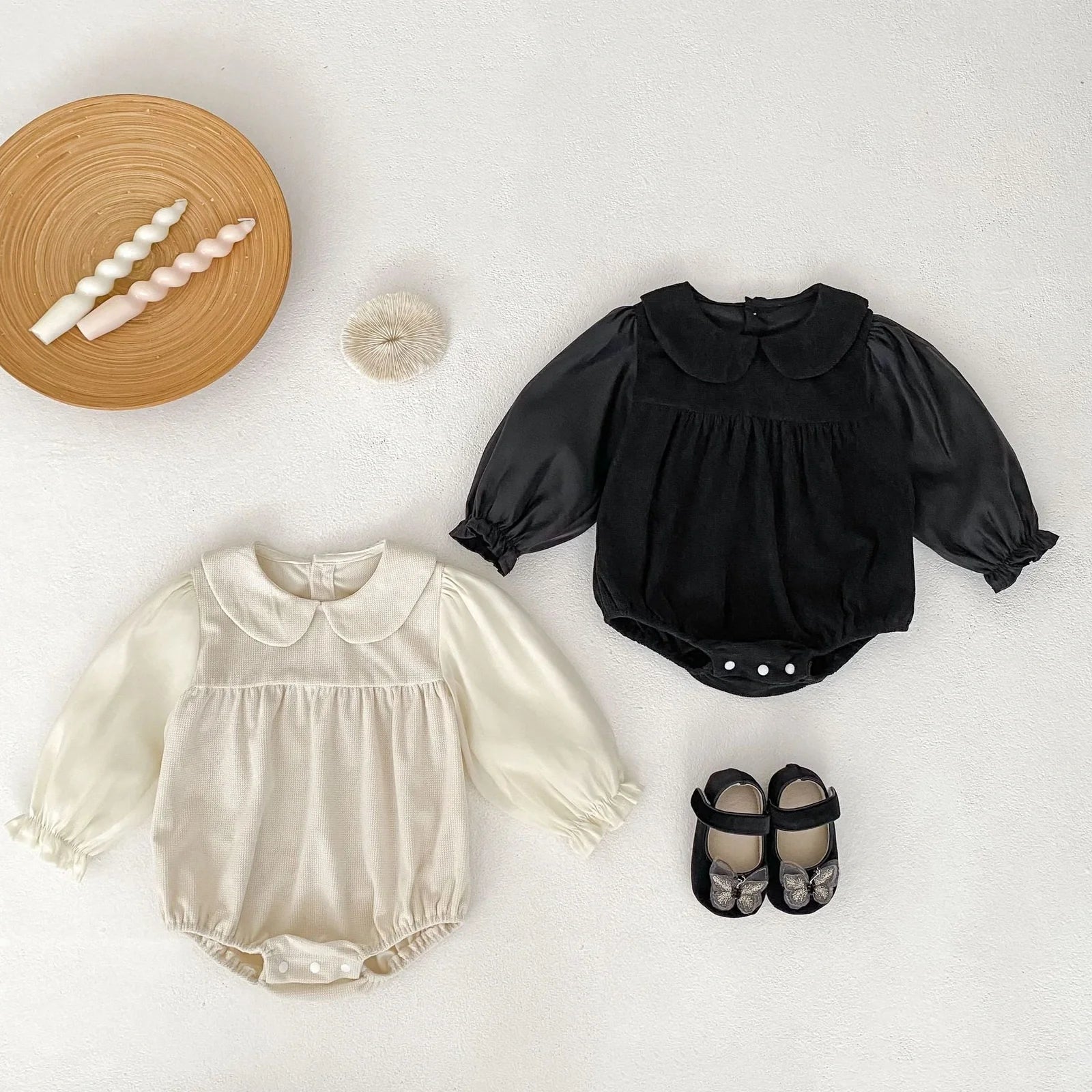 Corduroy doll collar long sleeve baby romper in black or apricot with single-breasted closure