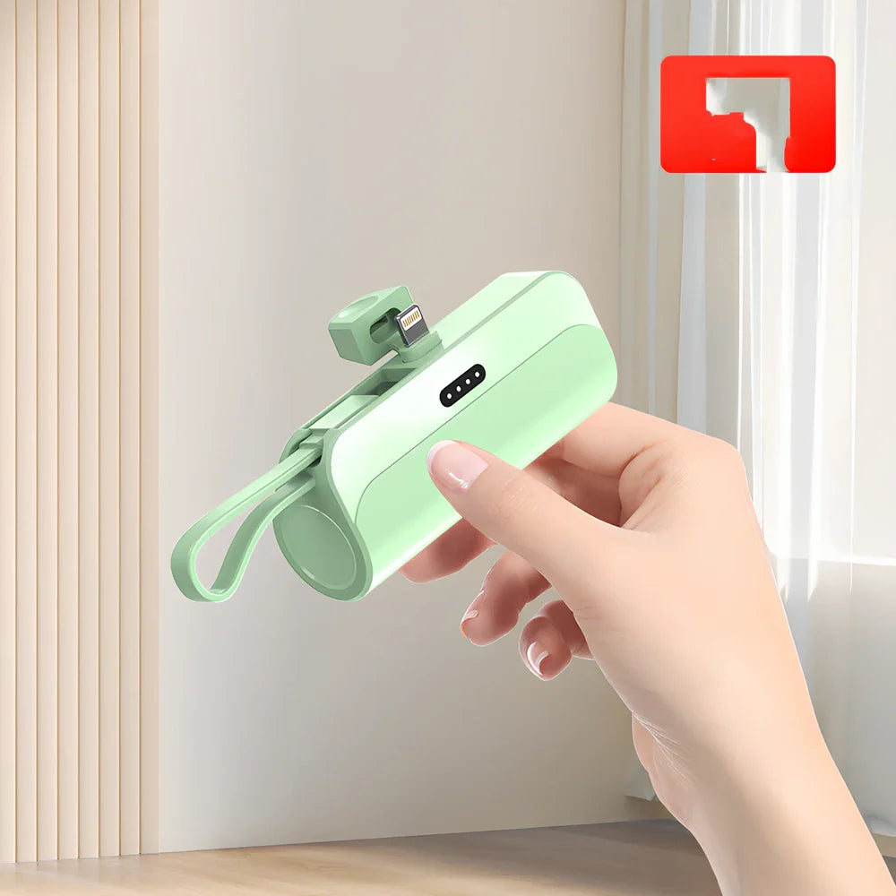 White capsule power bank showing compact 79mm size with USB charging ports visible