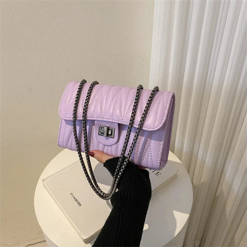 Retro textured diamond pattern women's small bag in beige colour with soft carry handle and single shoulder strap