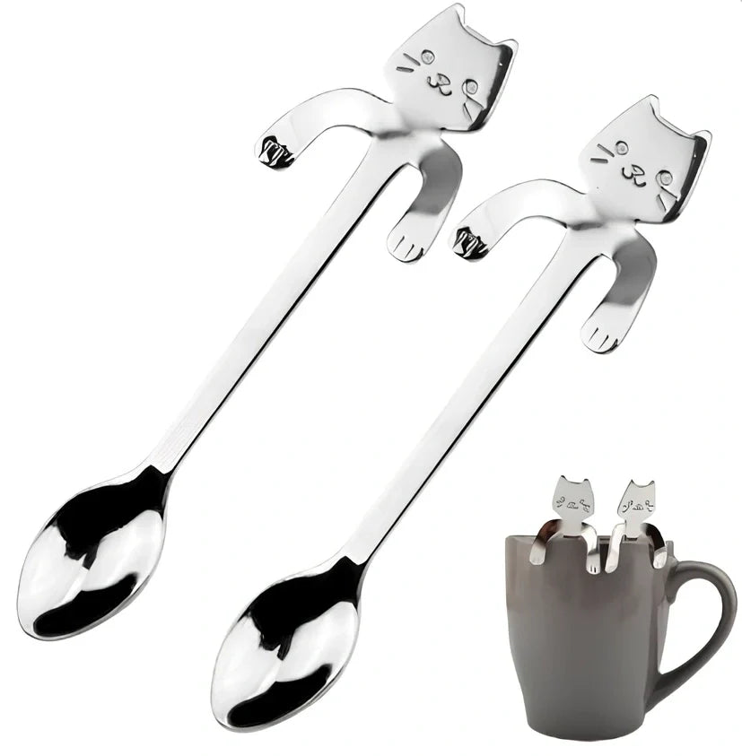 Stainless steel coffee spoon with cartoon cat handle design showing 11.7cm measurement scale