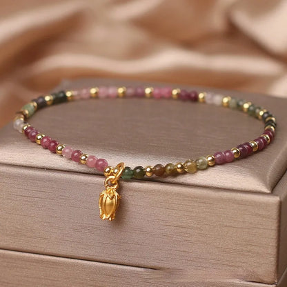 Natural Tourmaline flower anklet and bracelet for women showing beaded design and convertible jewellery functionality