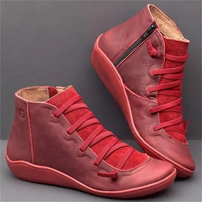 Women's casual booties with wedge heel and round toe in various colours like black and leopard print, showing rubber sole.