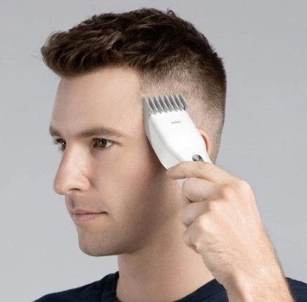 Men's cordless hair clippers with nano ceramic cutter and two-speed control, available in black and white.