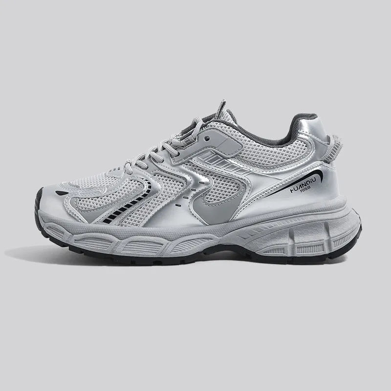 Grey platform casual sneaker with PU mesh upper, leather stitching, and a flat EVA sole.
