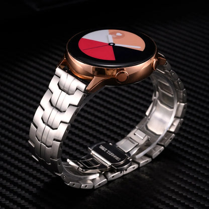 Stainless steel watch band for Samsung Galaxy Watch in multiple colour options on a grey background.