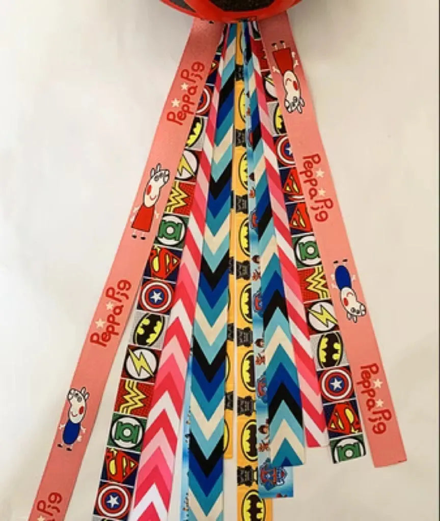 Children's helmet streamer with 60 cm polyester ribbon in colours like apricot and khaki for roller skating and skiing