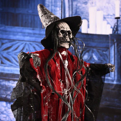 A spooky hanging skeleton ghost decoration with a chilling howl and flashing red eyes