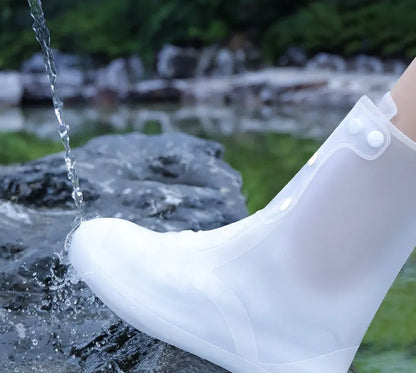 White high top PVC waterproof shoe cover for women with anti-skid sole.