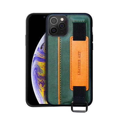 Brown imitation leather iPhone case with wrist strap attached, showing decorative stitching detail
