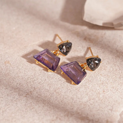 Geometric stud earrings for women in alloy with electroplated gold tone and steel needle, shown in four colour options.