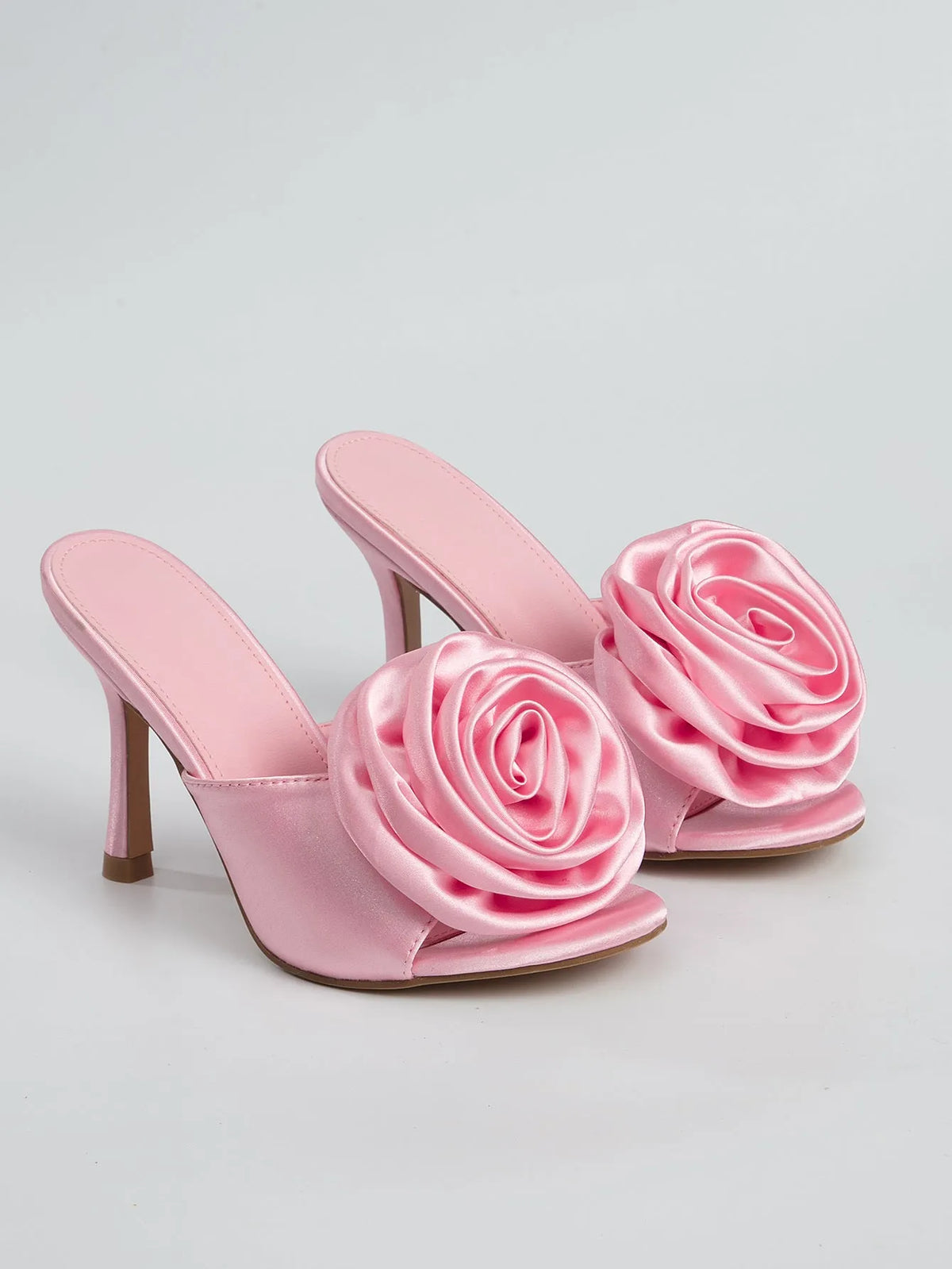 Ladies stiletto heel high heels in black, pink, or apricot with PU upper, PU lining, rubber sole, round toe, sizes 35-42.
