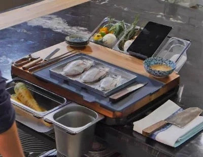 Bamboo cutting board with plastic storage trays for meal prep and organization