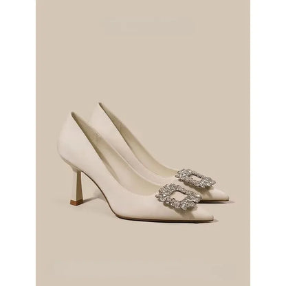 Women's pointed toe stiletto pumps with mid-height heel in beige or black colours