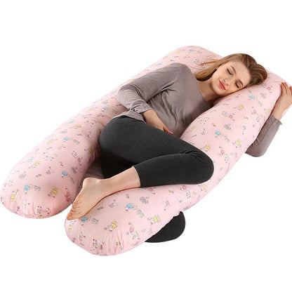 Large U-shaped pregnancy support pillow with removable cover and abdominal support belt.