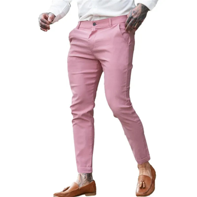 Men's slim fit elastic cotton pencil trousers in a solid colour on a hanger, showing the zip fly and mid waist design.