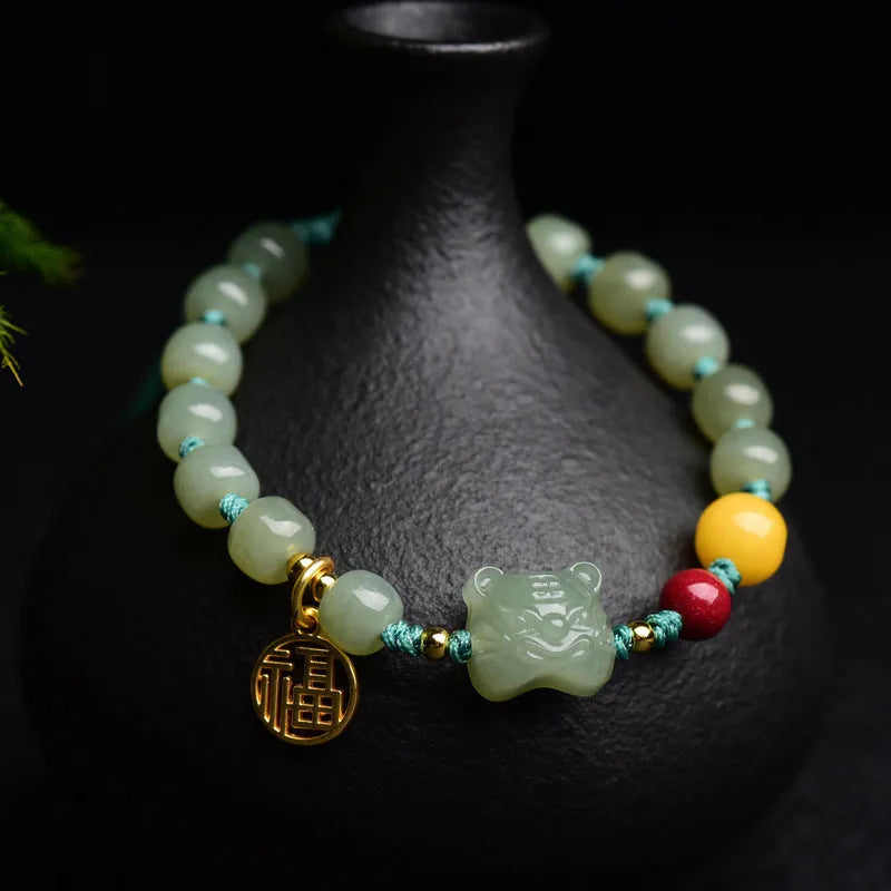 Natural Hetian jade cinnabar beeswax bracelet with animal zodiac modelling and 5x7mm beads