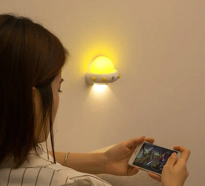 Remote control UFO bedside night light in blue, pink, or white colours with compact 105mm x 76mm dimensions