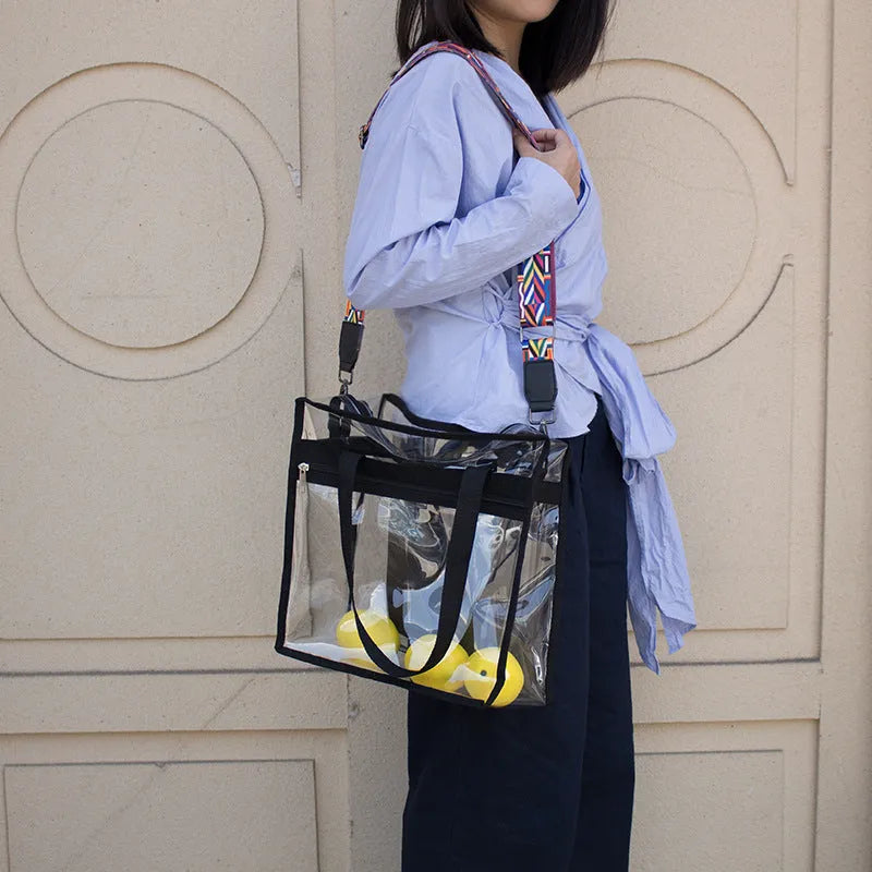 Women's PVC transparent shoulder messenger bag showing clear front panel with colour options and dual strap design
