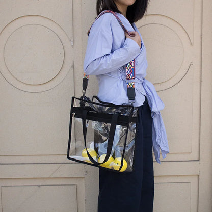 Women's PVC transparent shoulder messenger bag showing clear front panel with colour options and dual strap design