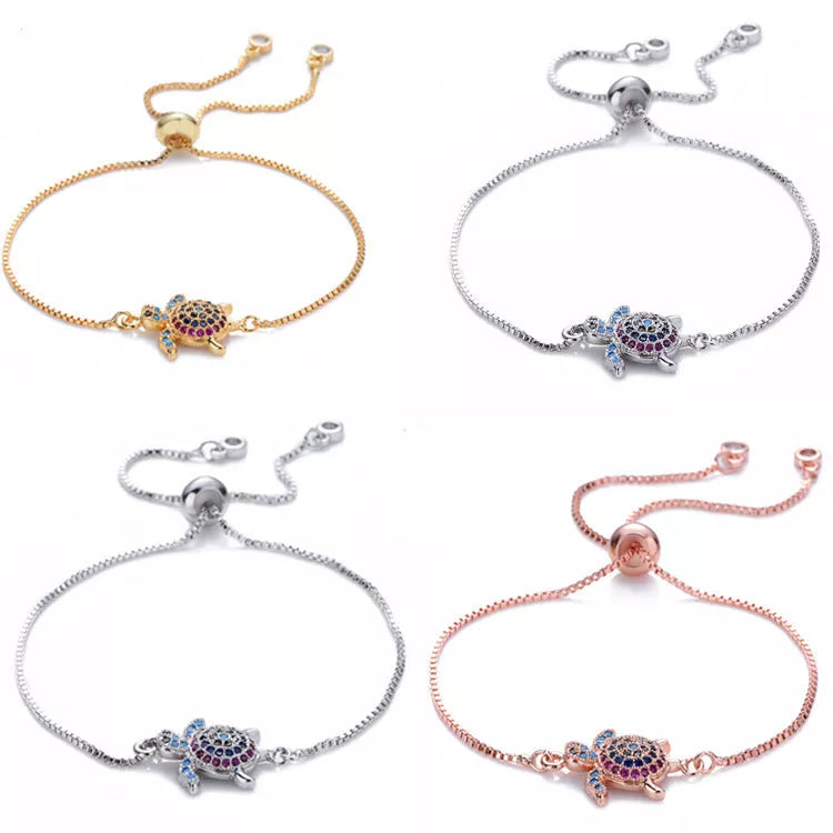 Adjustable sea turtle bracelet with sparkling rhinestones and amethyst inlay