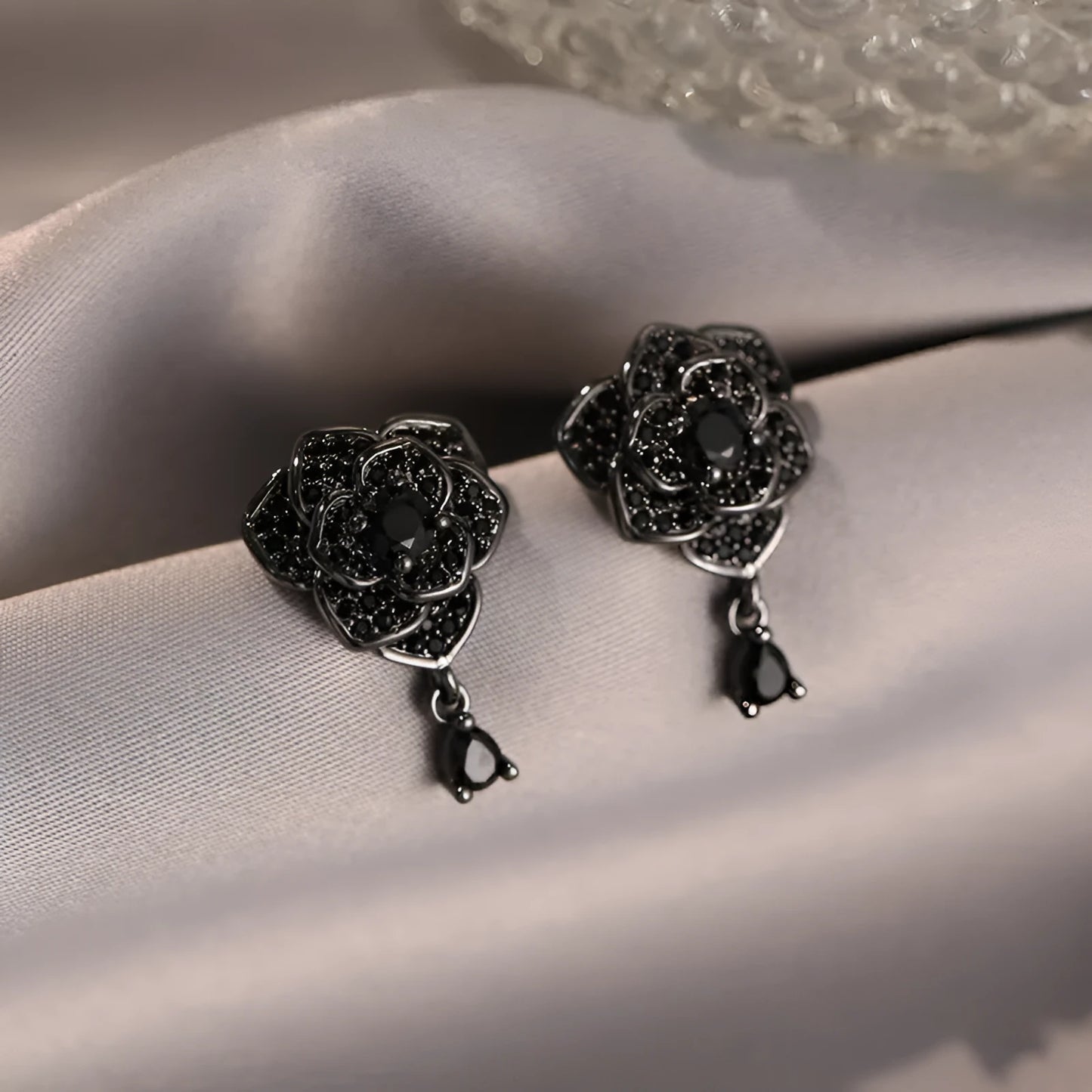 Black rose flower-shaped stud earrings with zircon inlay on gold-plated copper