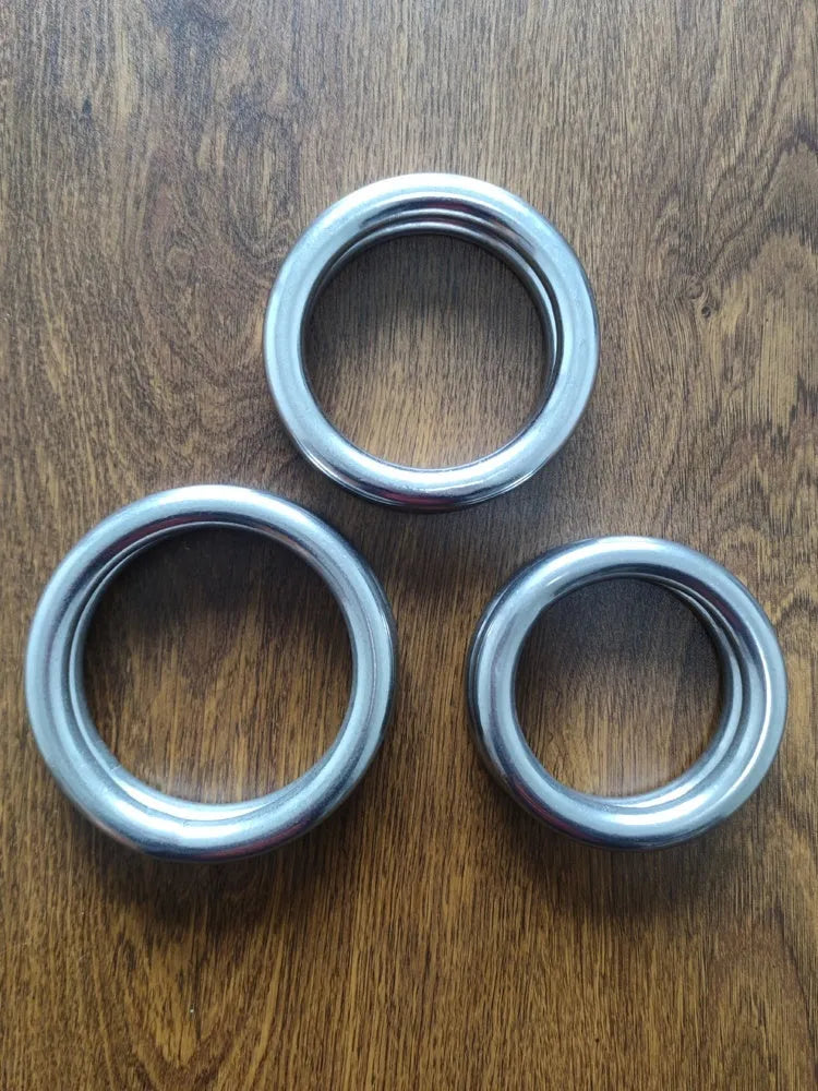 Wing Chun carbon steel training ring showing three adjustable sizes for forearm strengthening exercises