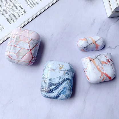 White marble hard PC protective case for AirPods charging box showing scratch protection