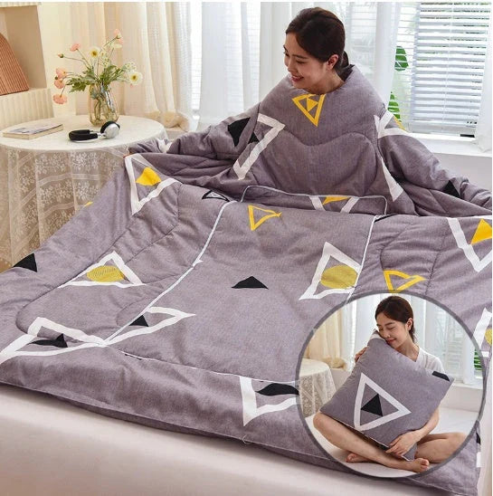 Cozy fleece blanket with sleeves in various colors, perfect for relaxing and enjoying indoor activities
