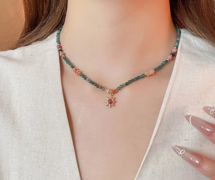 French court style freshwater pearl necklace with stone sun pendant on clavicle chain